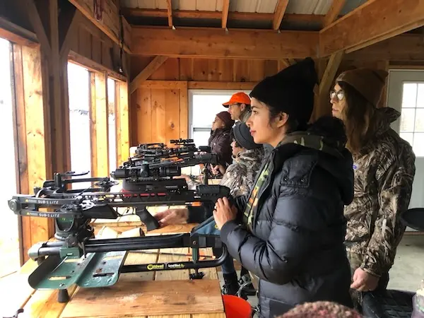 HOC group learning about crossbows.